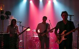 Recording session with musicians in a studio